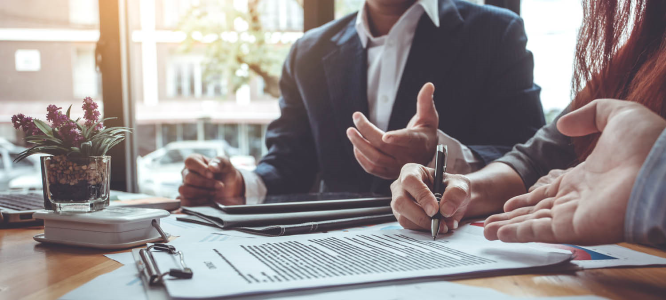 Sales people sitting in an office